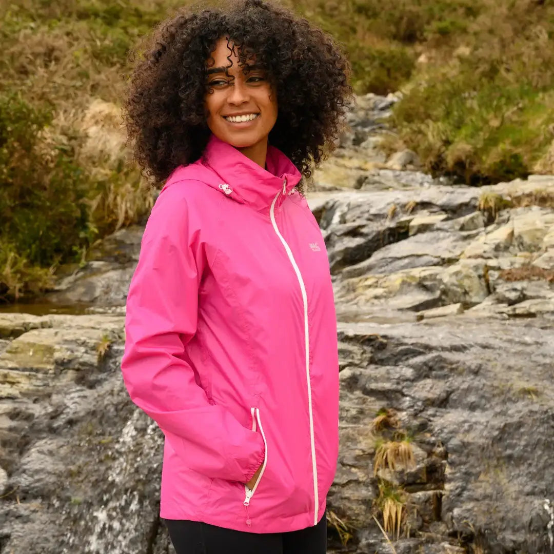 Bright pink Mac in a Sac Origin 2 Waterproof Jacket for adults, perfect country clothing