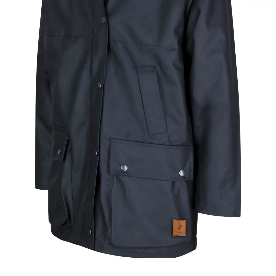 Black waterproof traditional wax jacket with pockets and leather logo for forest clothing