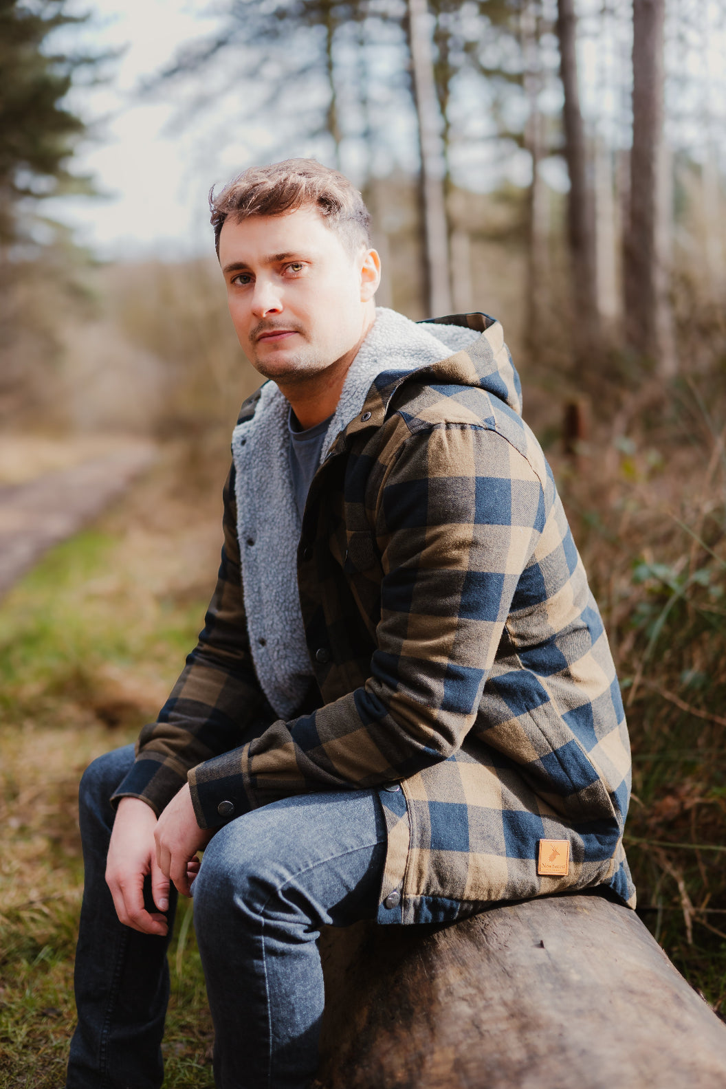 Plaid hooded jacket from New Forest Canadian Sherpa Shirt for a cozy lumberjack look