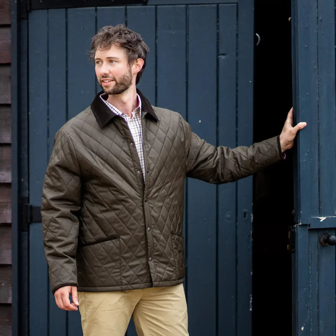 Man in a quilted olive jacket and khaki pants showcasing the Forest Classic Quilted style