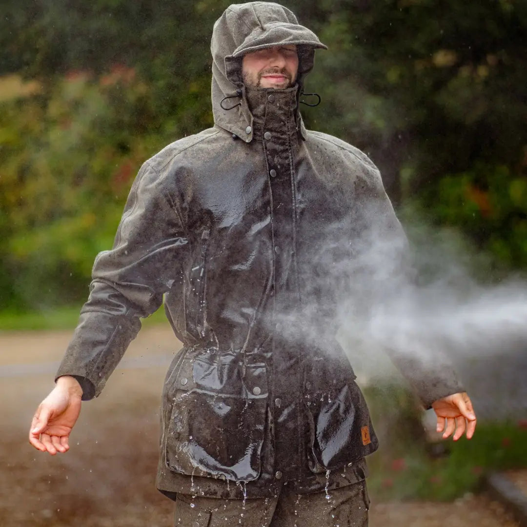 Person in a Raincoat enjoying rain, showcasing the New Forest Country Sport Jacket