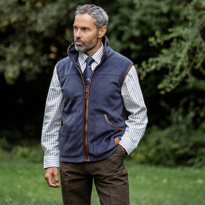 Navy blue fleece gilet with brown trim from New Forest, perfect for cozy layering