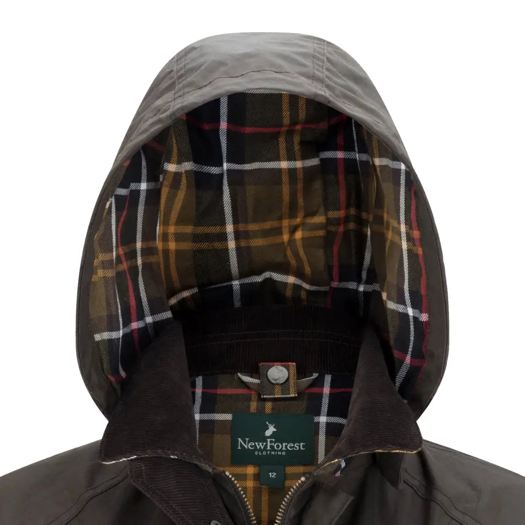 Hooded New Forest Freya Ladies Wax Jacket with plaid lining and label detail