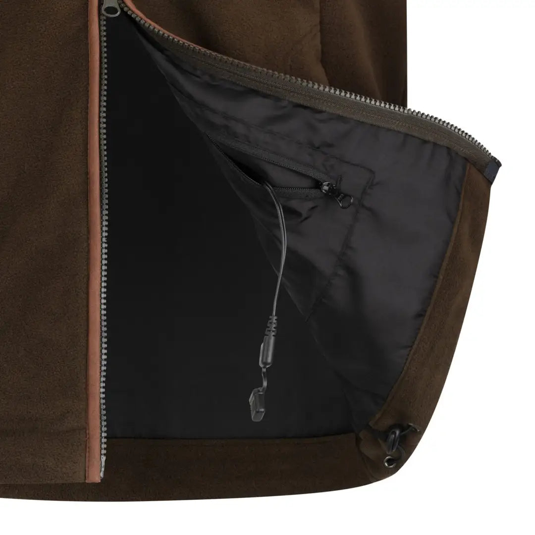 Partially unzipped pocket showcasing the dark lining and cord of the New Forest Heated Fleece Gilet