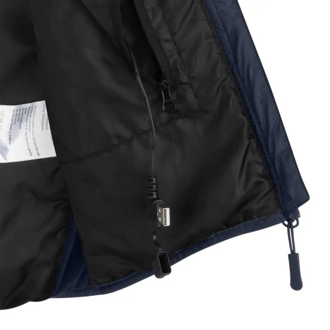 Close-up of the New Forest Heated Gilet’s cozy interior lining and zipper