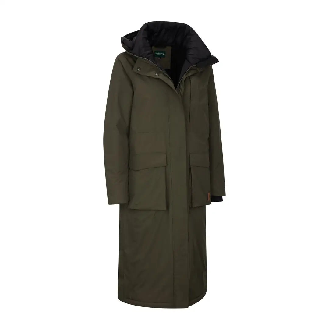 Long olive green ladies Arctic Parka with black collar and large pockets for winter style