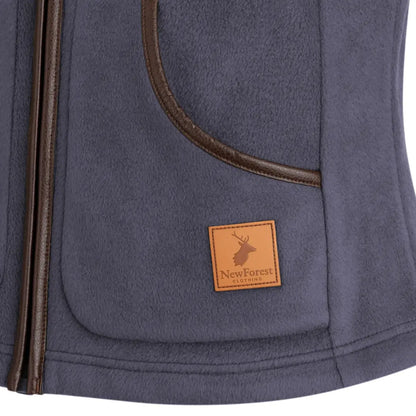 Close-up of New Forest Ladies Fleece Gilet featuring deer logo leather patch