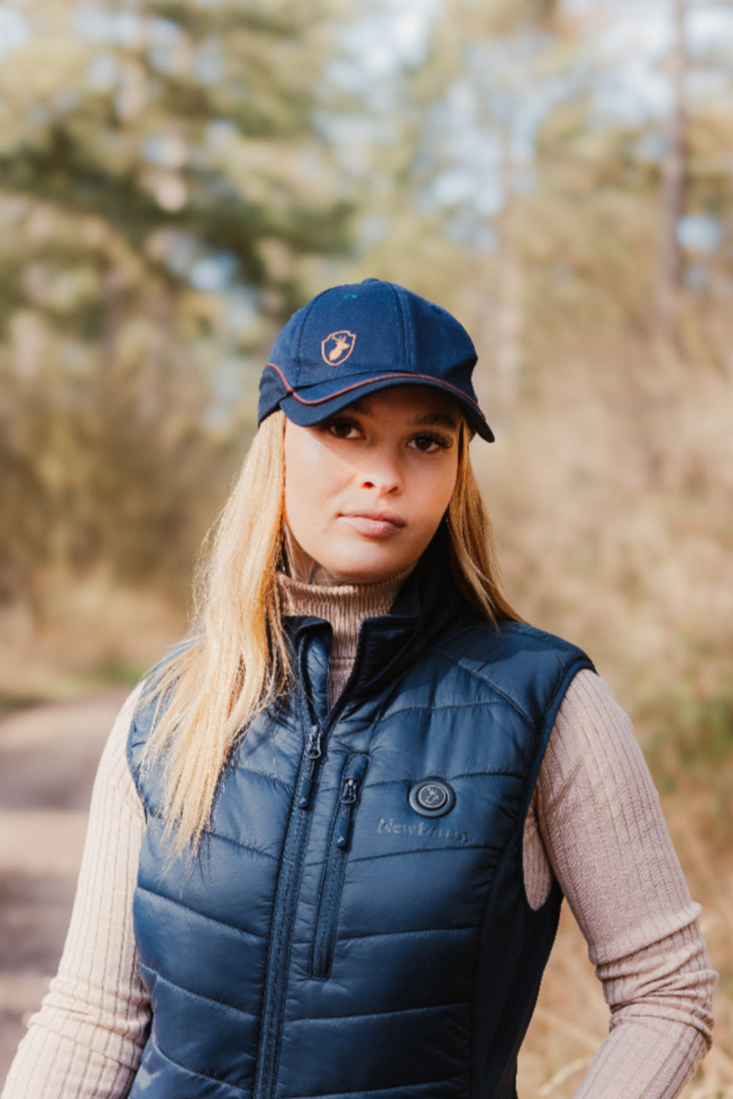 Navy blue quilted vest from the New Forest Ladies Heated Gilet collection