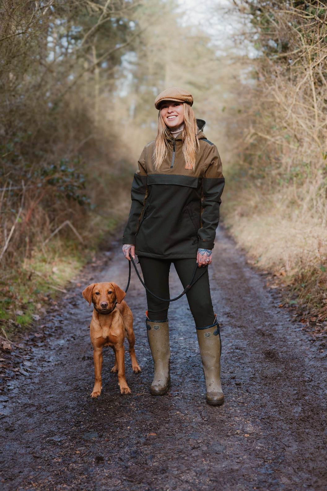 Woman in outdoor gear with dog wearing the New Forest Ladies Nightjar Smock