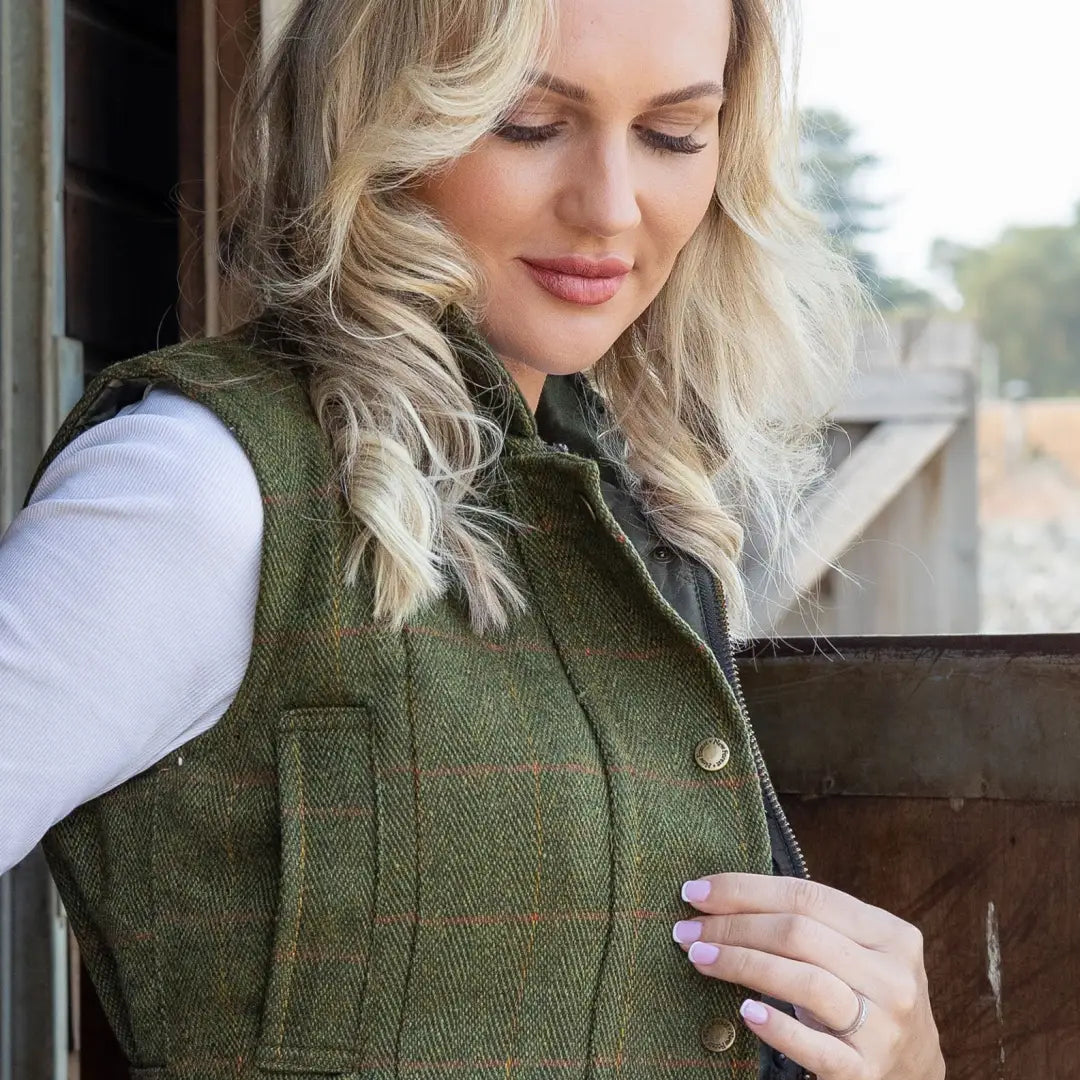 Green tweed gilet with plaid over a white shirt from New Forest Ladies Tweed collection