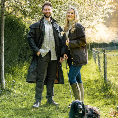 Couple in New Forest Moleskin Trousers enjoying a day out with their dog