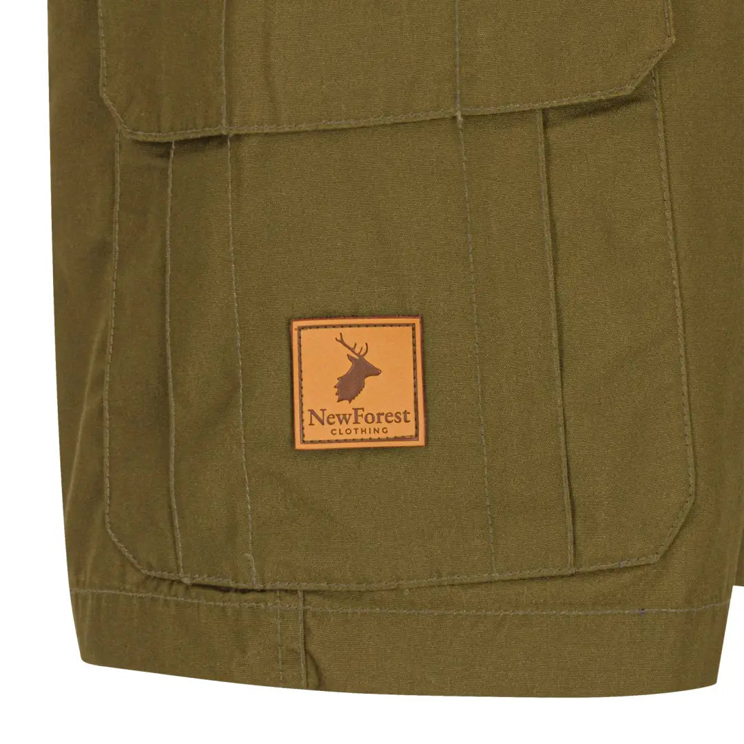 Olive green New Forest Trail Shorts with deer logo patch for stylish outdoor adventures