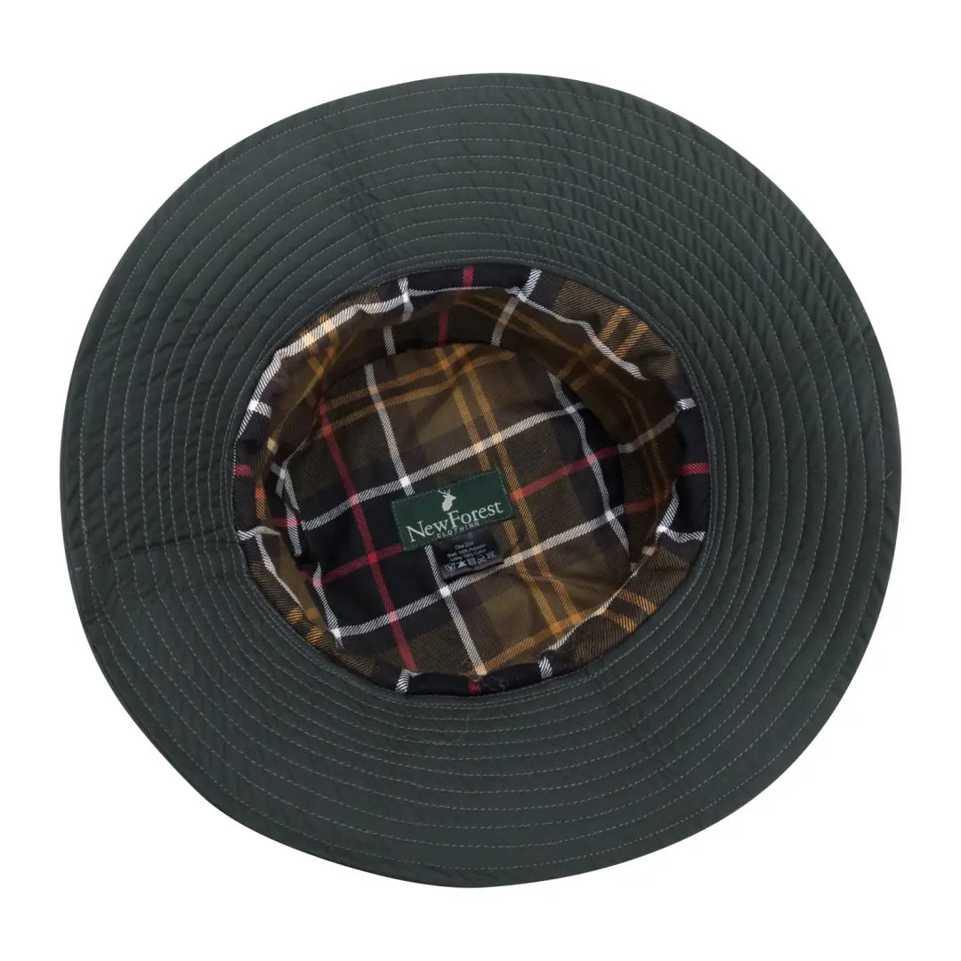 Dark green bucket hat with plaid lining, perfect for your Forest Victoria Waterproof adventures