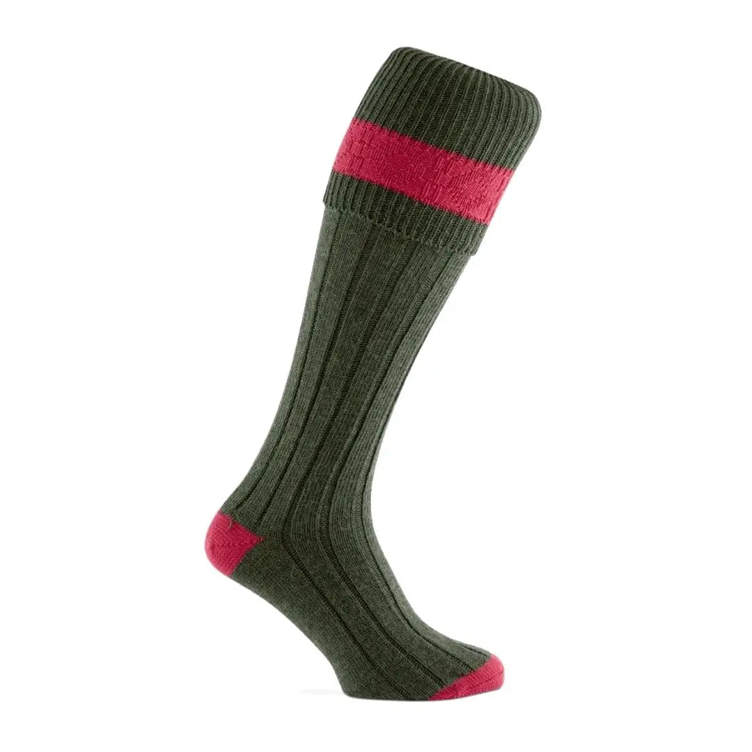 Knee-high dark green Pennine Byron Shooting Socks with red accents at the top and toe