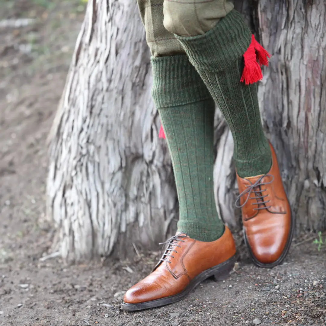 Brown leather oxford shoes with Pennine Gamekeeper shooting socks and green knee-highs