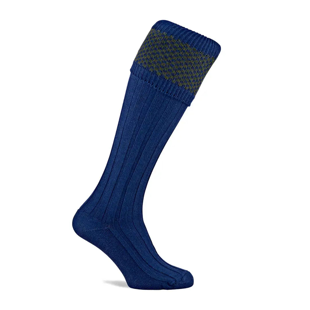 Blue knee-high Pennine Penrith Shooting Socks with a gray patterned band at the top