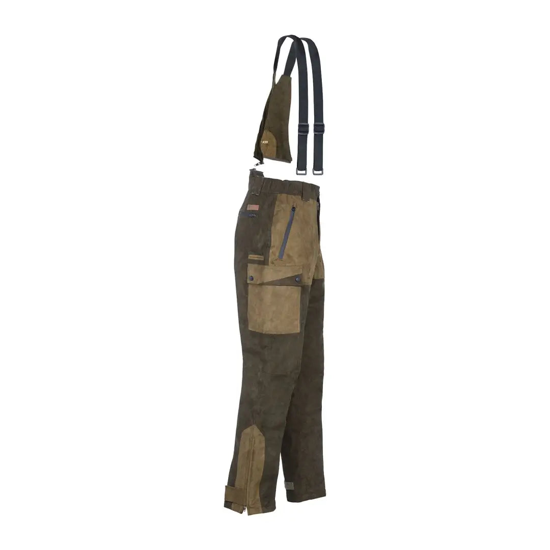 Rugged Percussion Grand Nord Trousers with suspenders in earthy tones for outdoor adventures