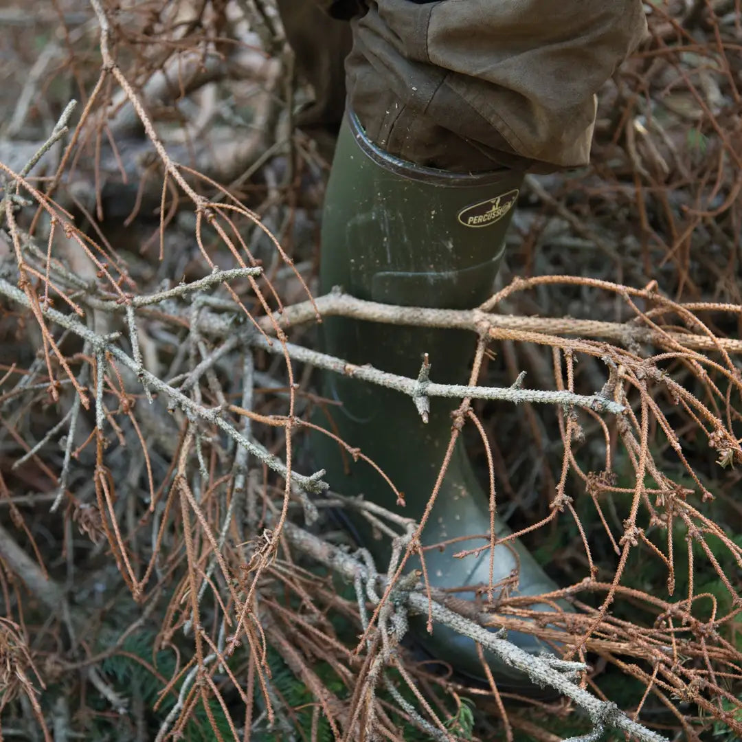 Green Percussion Marly Jersey Wellington Boots with slip rubber sole among dry twigs