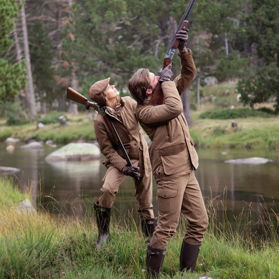 Two hunters in grassy outdoor setting wearing Percussion Rambouillet Original Trousers