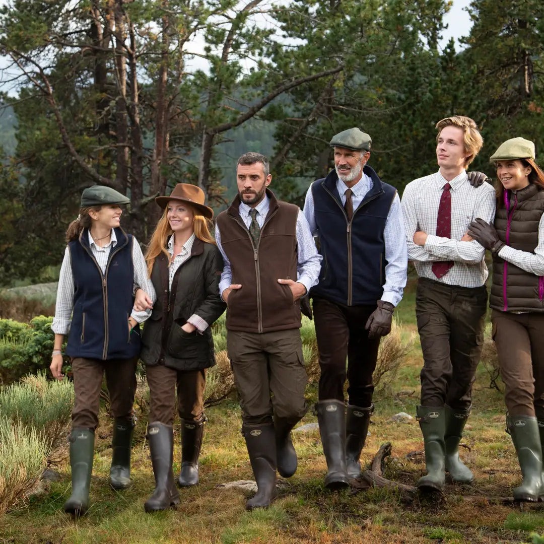 Group of people in country attire enjoying the outdoors with Percussion Scotland Ladies fleece vest