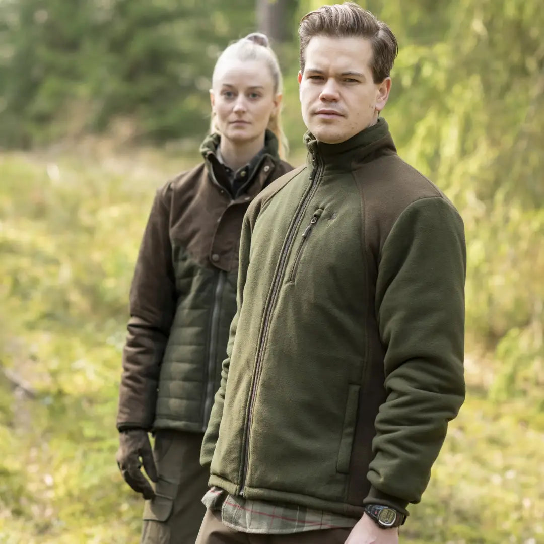 Two people in outdoor jackets enjoying nature with Pinewood Harrie Fleece