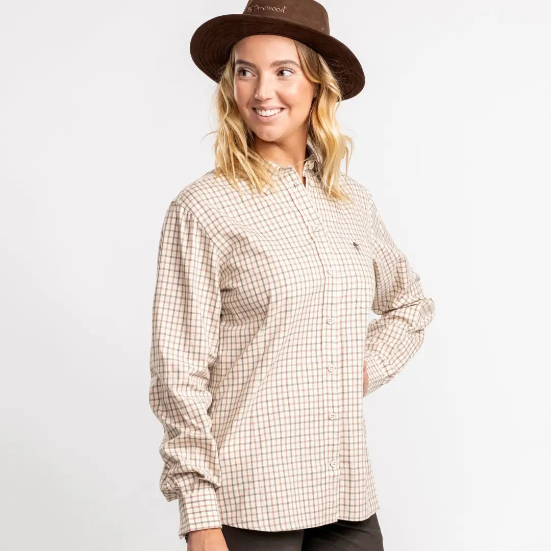 Smiling blonde woman in Pinewood Ladies Nydala Grouse Shirt and brown hat