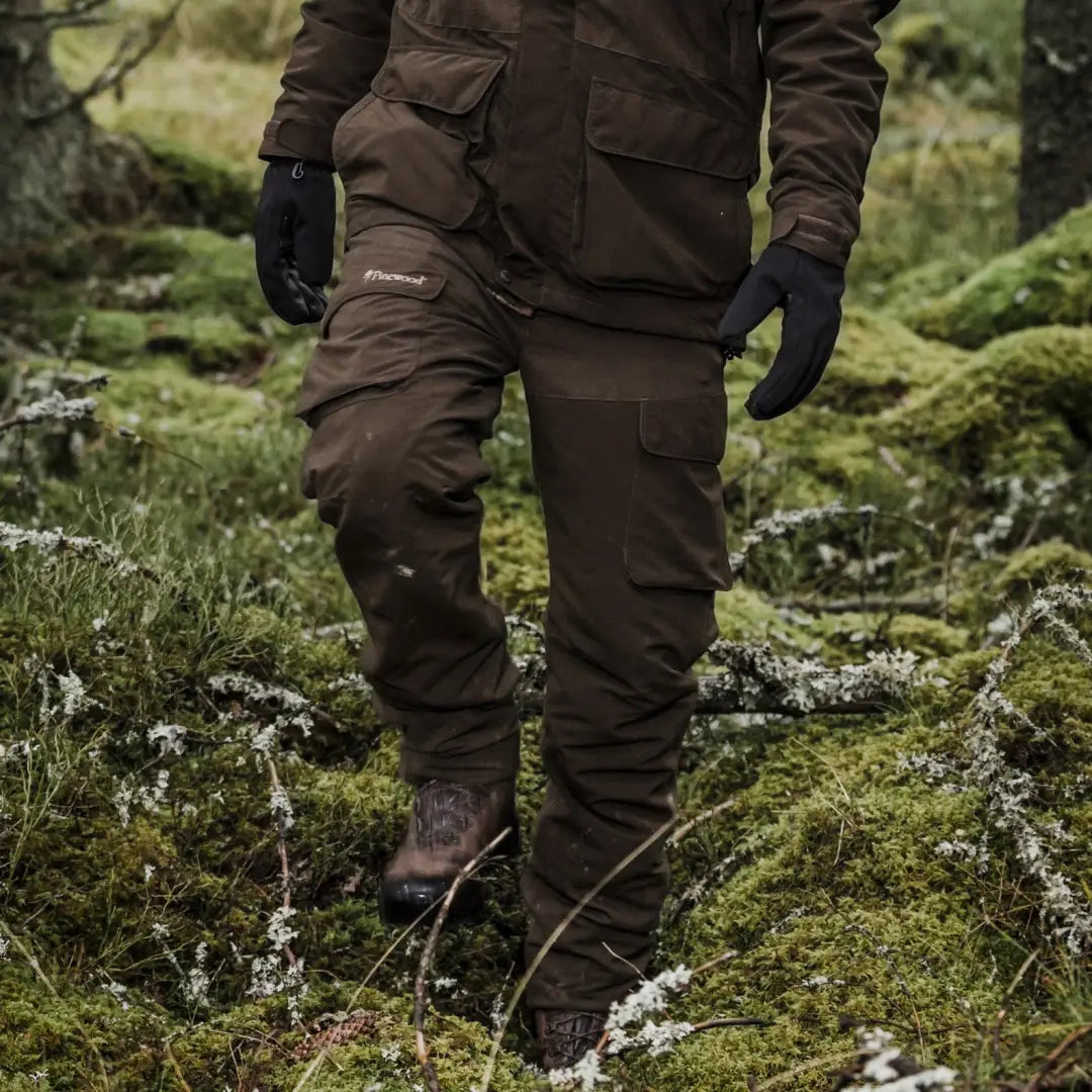 Rugged dark brown ensemble featuring Pinewood Smaland Light Trousers for outdoor adventures