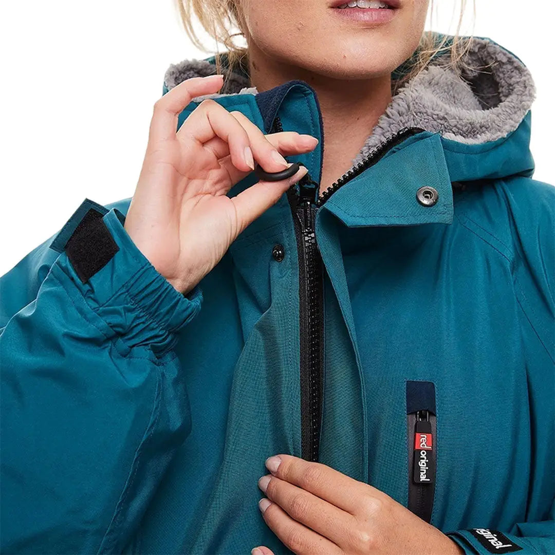 Teal winter jacket with fur-lined hood, great for your Red Pro Change Long Sleeve Evo Jacket