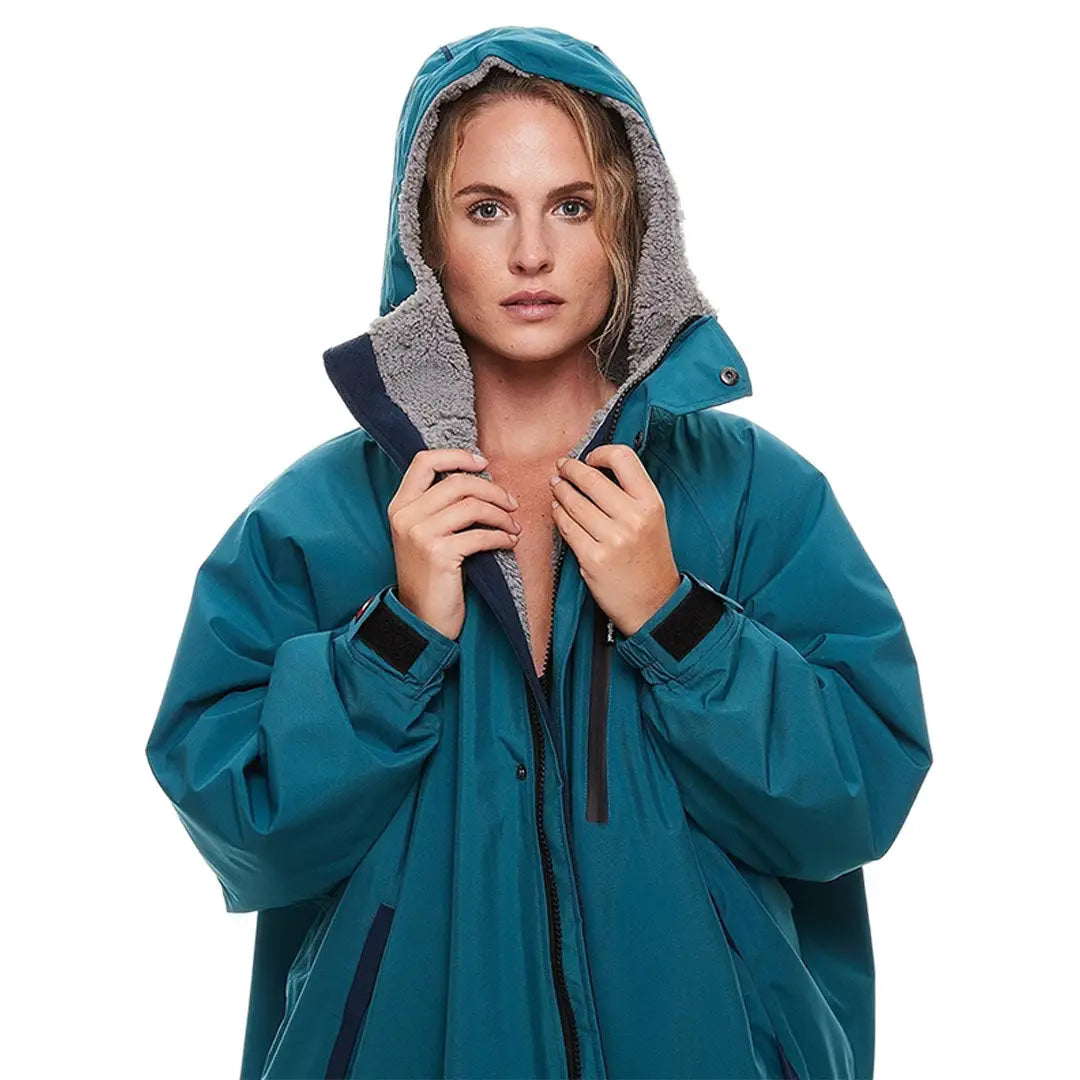 Teal hooded winter coat with gray lining for the ultimate changing robe experience