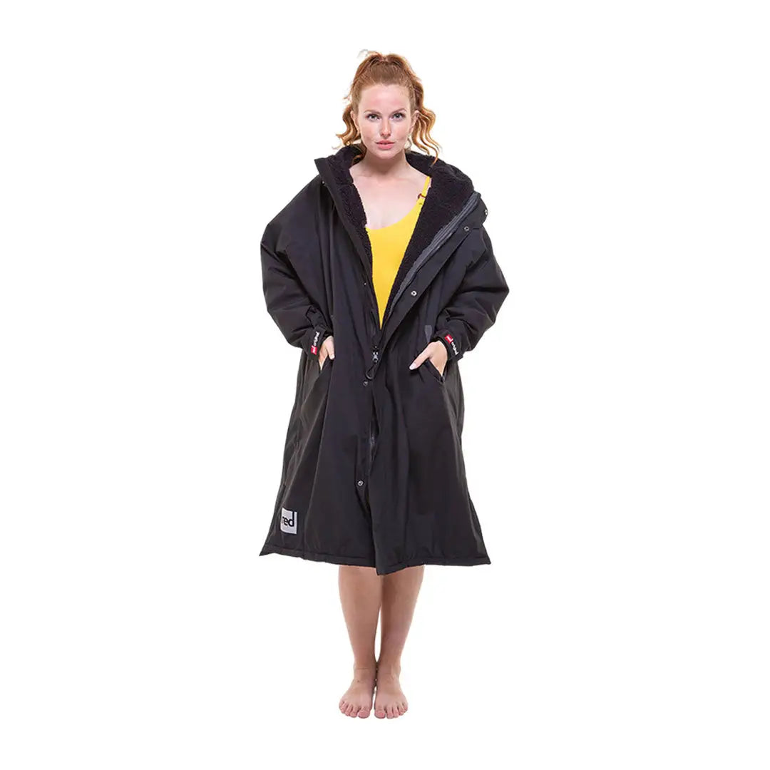 Long black change robe with hood over yellow top, perfect for the Red Pro Change Evo Jacket