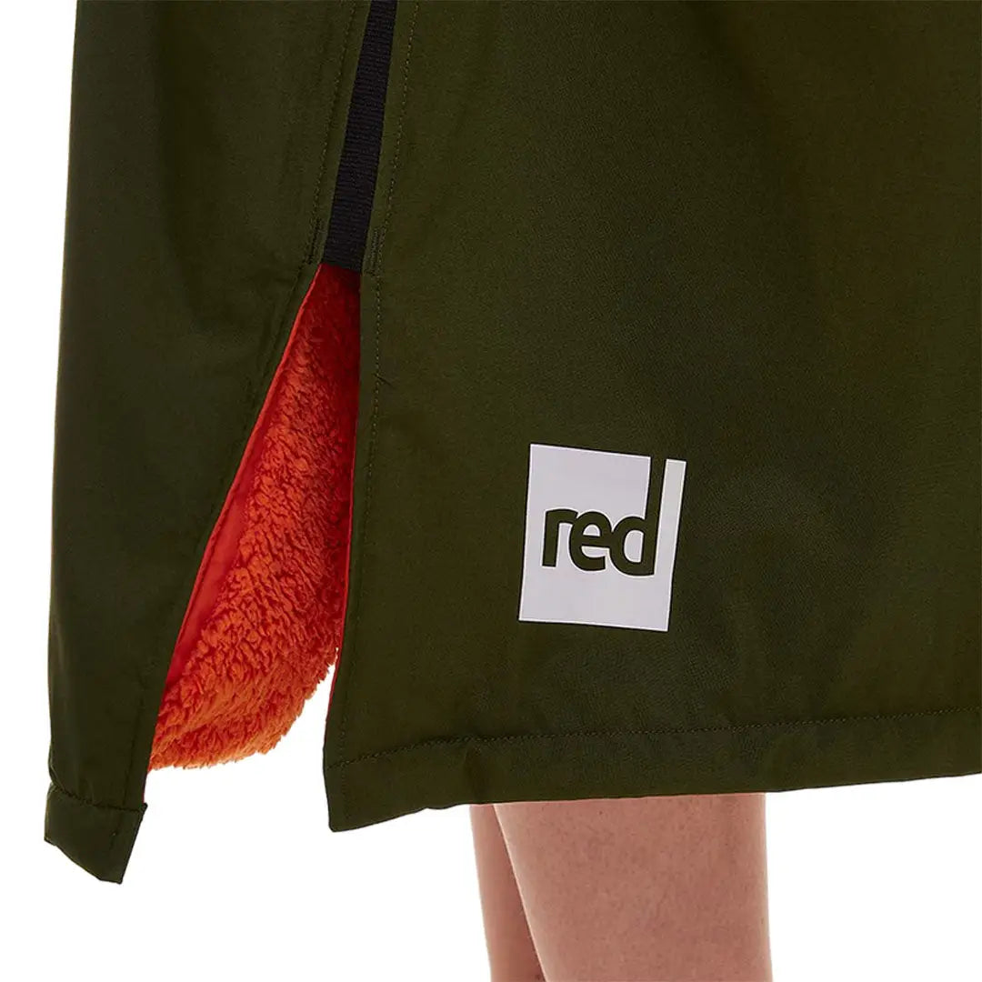 Green dress with red lining and logo, perfect for your Red Pro Change Long Sleeve Evo Jacket