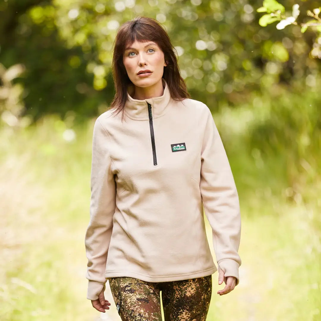 Beige quarter-zip fleece pullover for ladies with green logo, perfect for outdoors and hunting