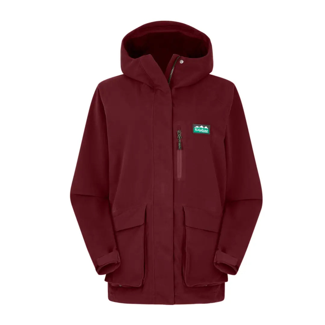 Burgundy Ridgeline Ladies Rhea Jacket with teal logo patch perfect for any field coat style