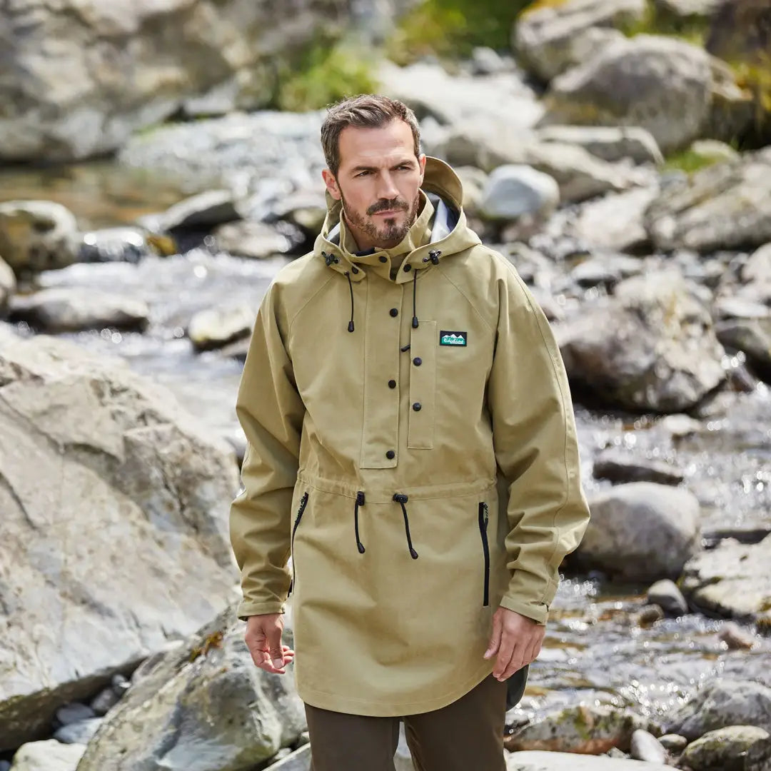 Khaki outdoor jacket with drawstrings and pocket, perfect for the Monsoon Nunatak Smock