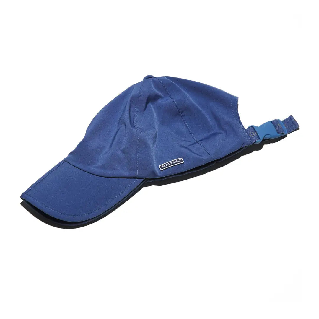 Blue Sealskinz Salle Cap with adjustable strap, perfect for country clothing or hunting