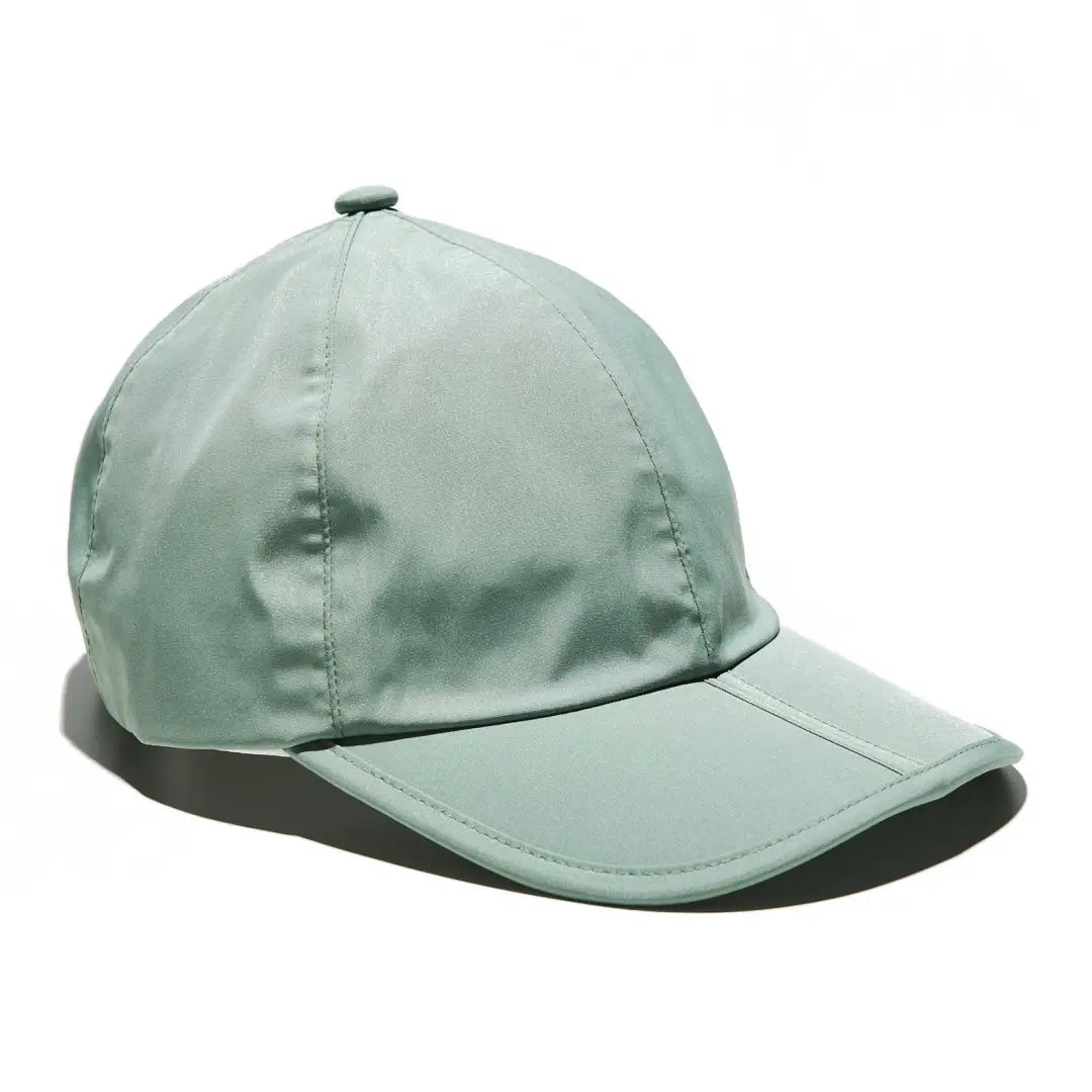 Mint green Sealskinz Salle Cap with a curved brim for stylish outdoor adventures