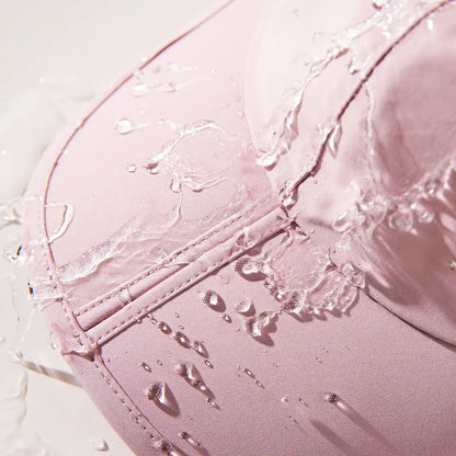 Pink liquid splashing in the outdoors, perfect for country clothing and hunting vibes