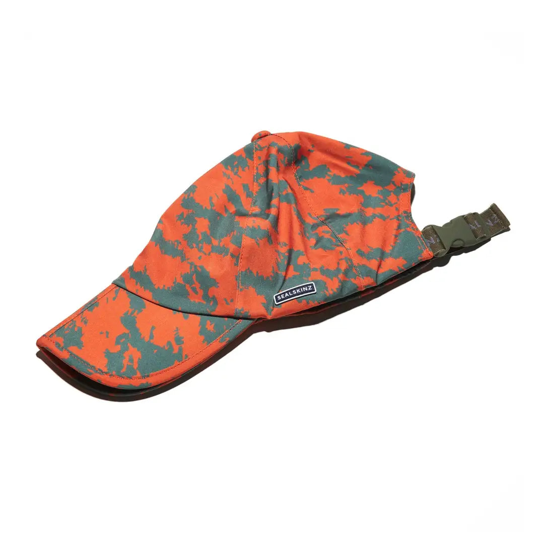 Camouflage Sealskinz Salle Skinz Cap in orange and green colors for outdoor adventures