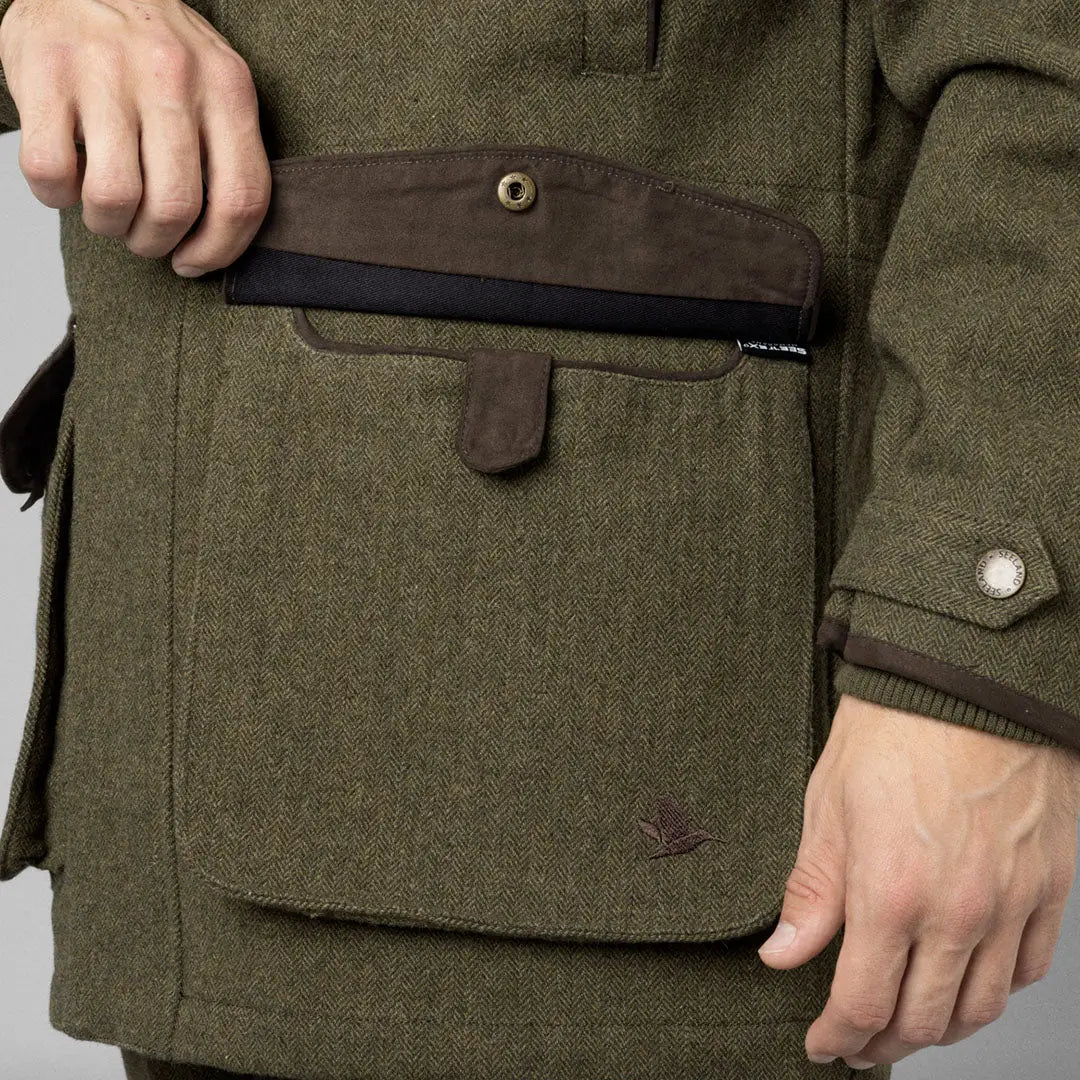 Olive green Seeland Hillside Jacket with a stylish front pocket and belt