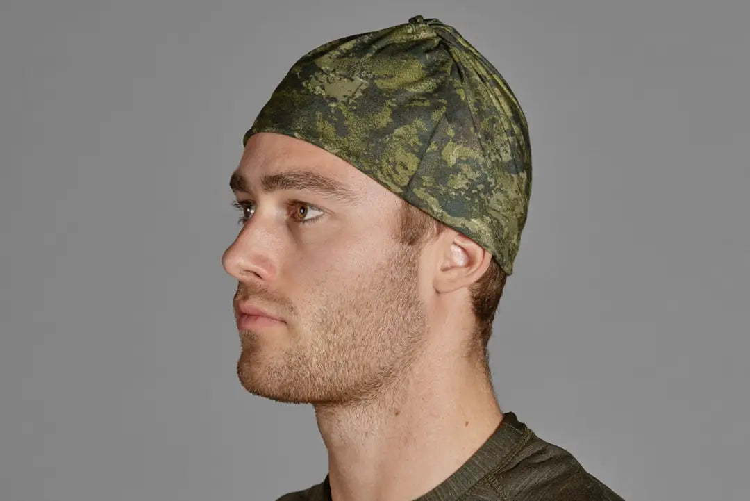 Camouflage cap on a bearded man with Seeland Neck Gaiter 2-Pack in view