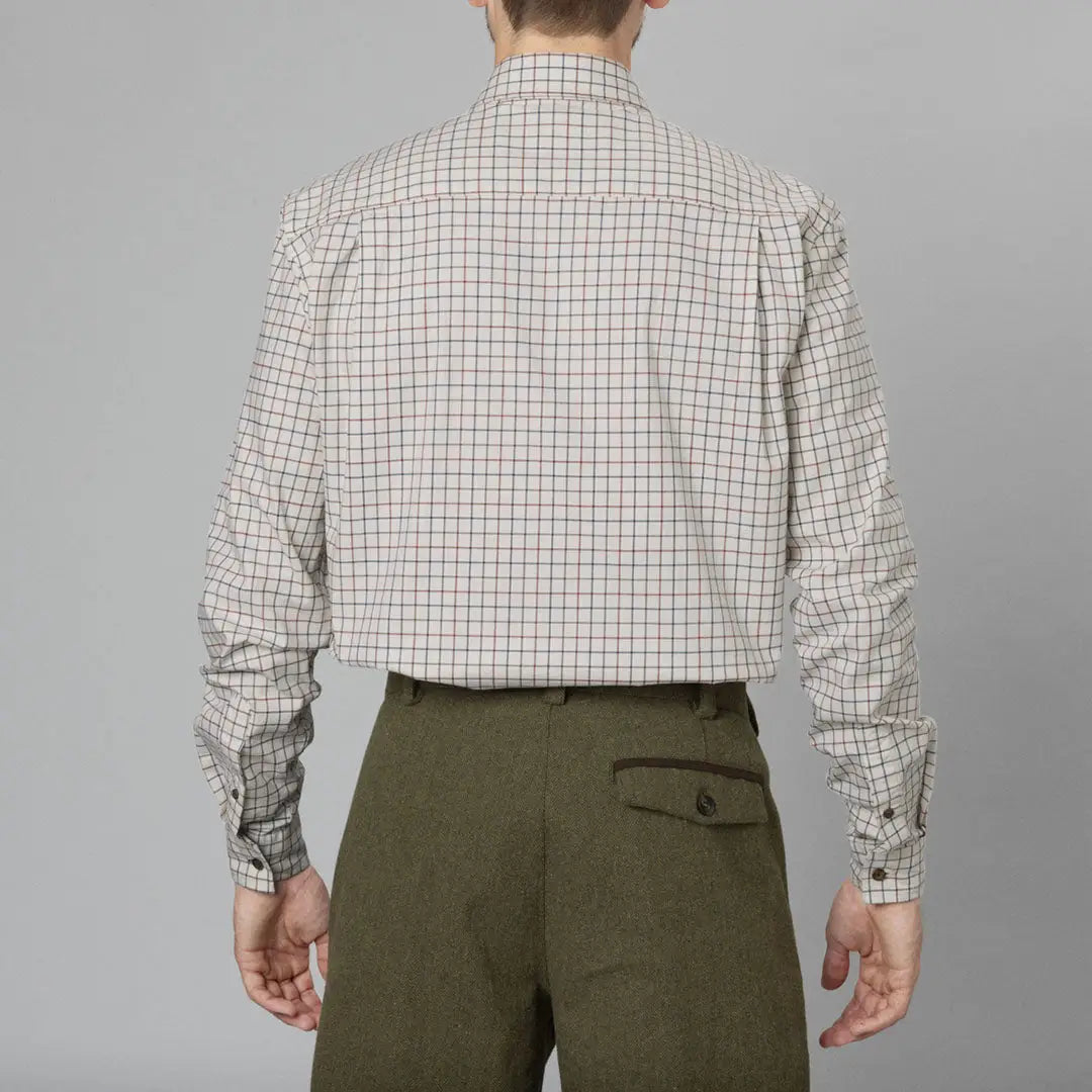 Man in Seeland Oxford Shooting Shirt, a breathable cotton blend, olive green trousers