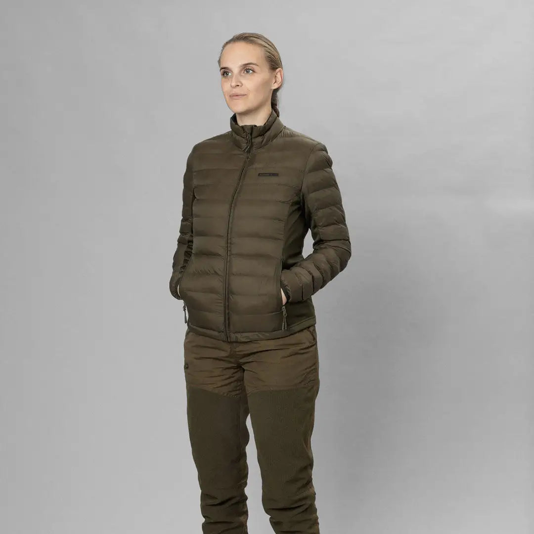 Woman in olive green Seeland Therma Jacket and pants, perfect for country clothing and hunting