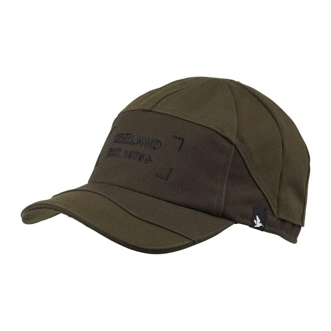 Olive green Seeland Trax Cap with short brim and stylish side text detail