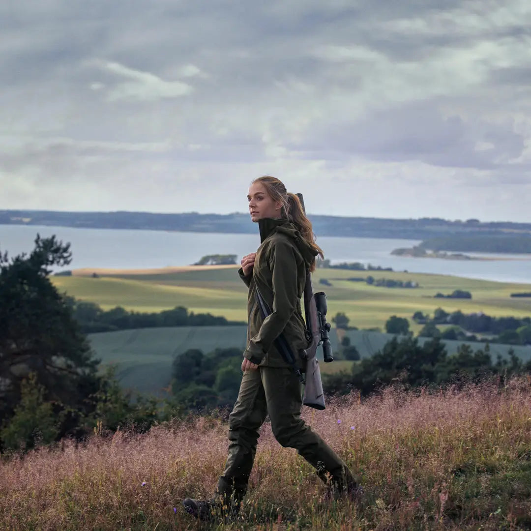 Woman in country clothing walking through a field in Seeland Womens Avail Jacket