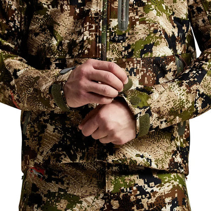 Camouflage Sitka Thunderhead Jacket featuring a pixel pattern in earth tones for hunting