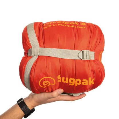 Bright orange Snugpak Travelpak 4 sleeping bag with built-in mosquito net in hand