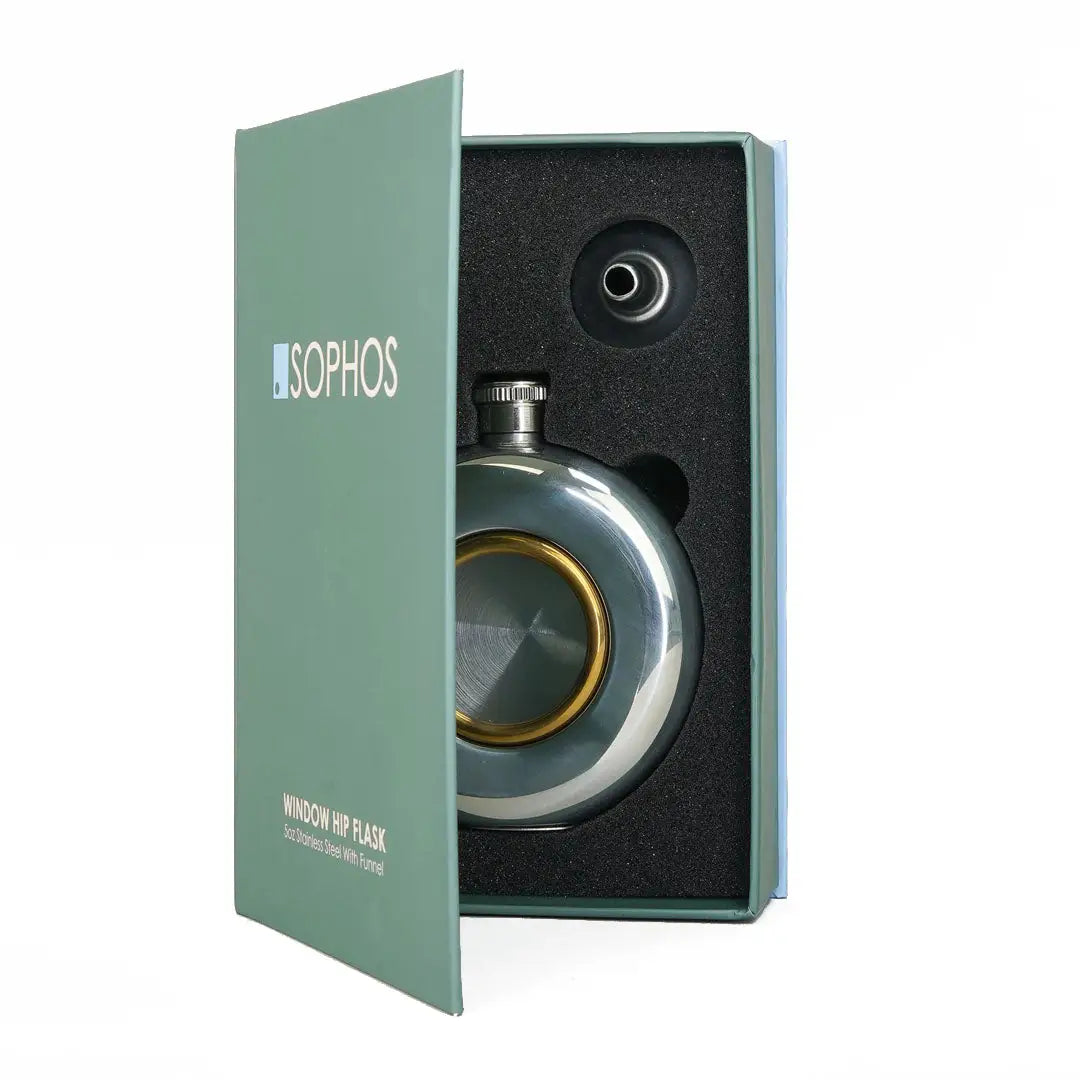 Round stainless steel flask with gold rim in a green box, perfect for outdoors and hunting