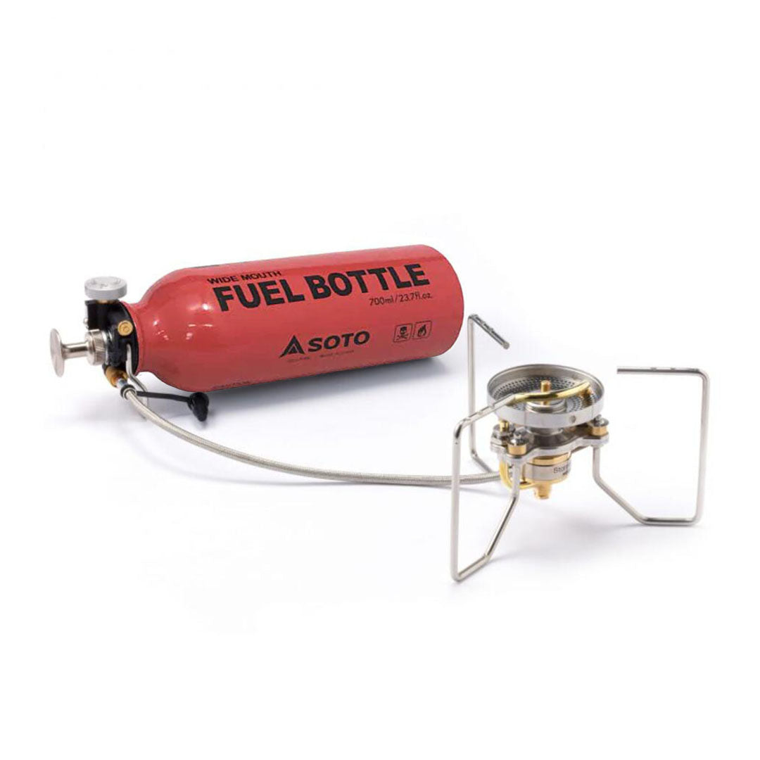 Red fuel bottle linked to Soto StormBreaker camping stove for outdoor adventures