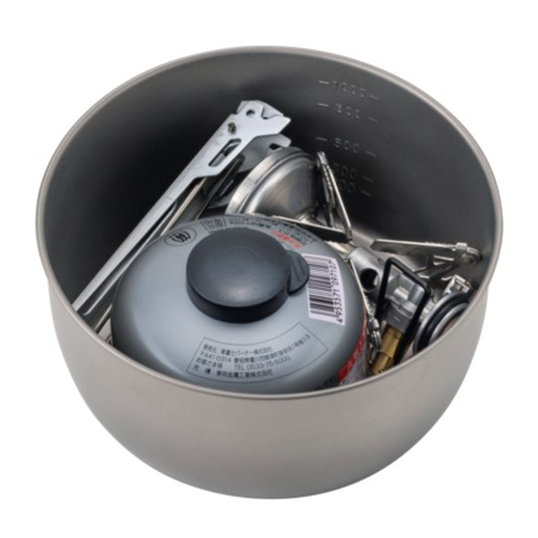 Camping stove and accessories in a Soto Titanium Pot 1100 for outdoor adventures