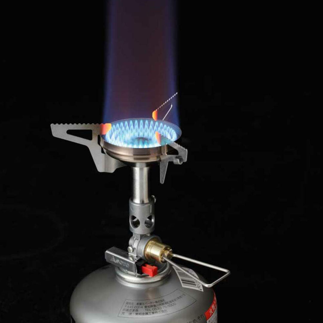 Portable Soto Windmaster with 4Flex camping stove showcasing a blue flame